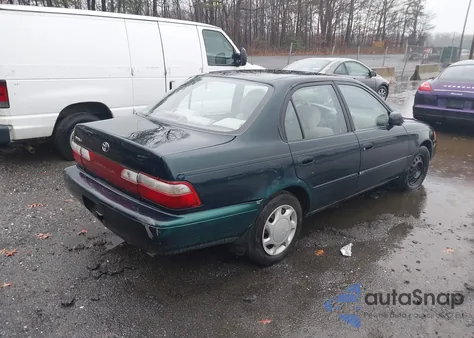 1997 Toyota Corolla Dx z USA, uszkodzony, nr VIN 2T1BB02E5VC199703